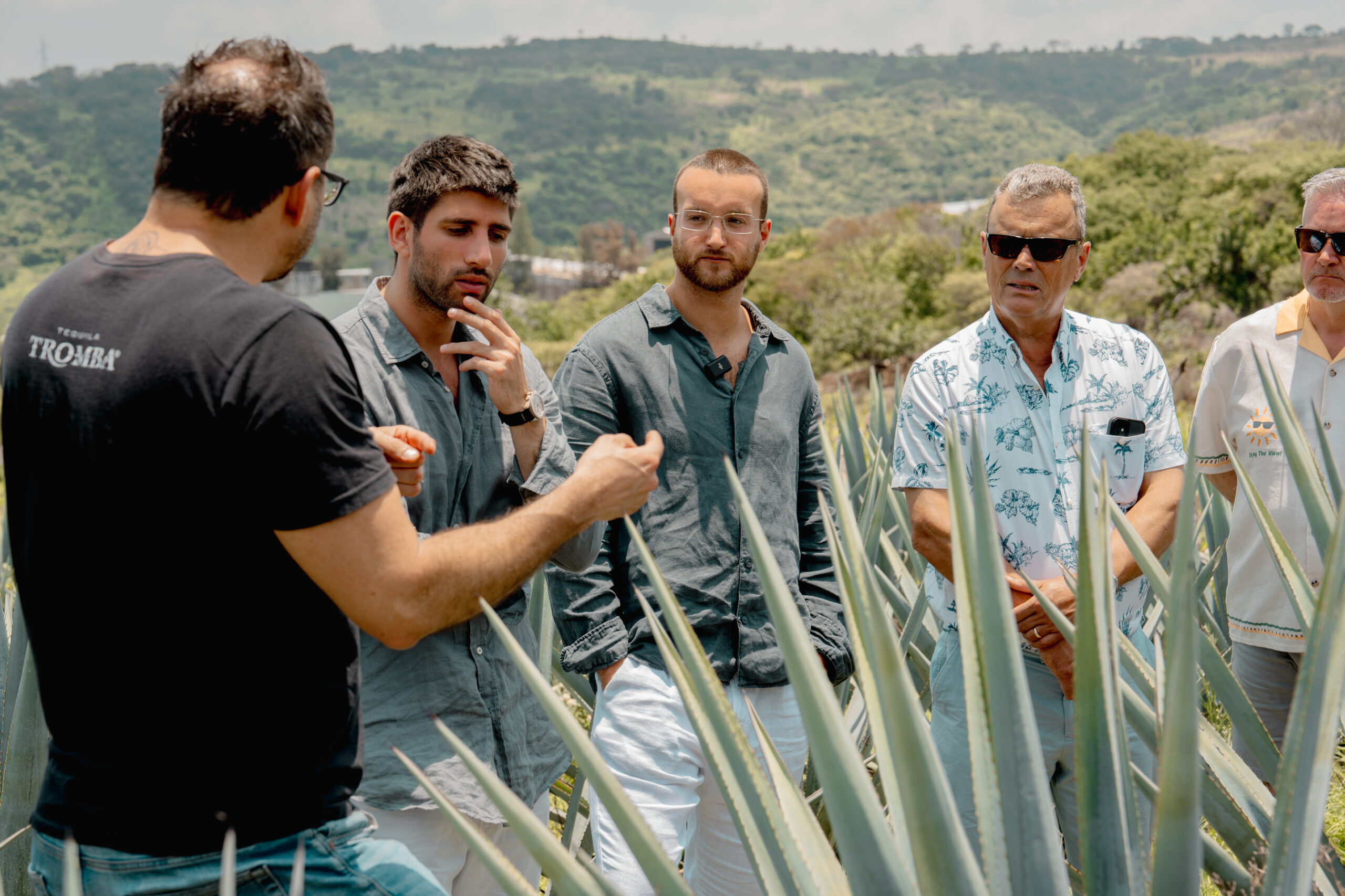 Marc Mouannes and Sam Gordon on an Agave field owned by Tromba Tequila.
